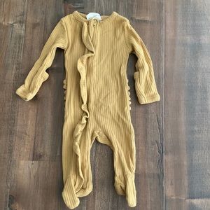 Spearmint Love Ribbed Ruffle Footed Onesie in mustard yellow in size newborn